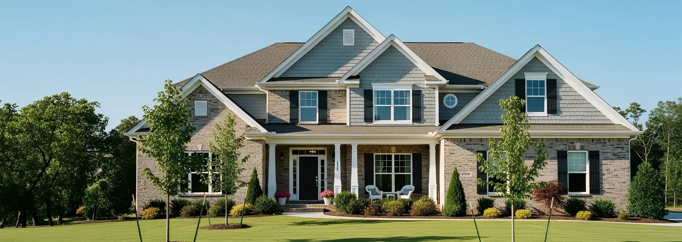 front of two story home with brick and siding