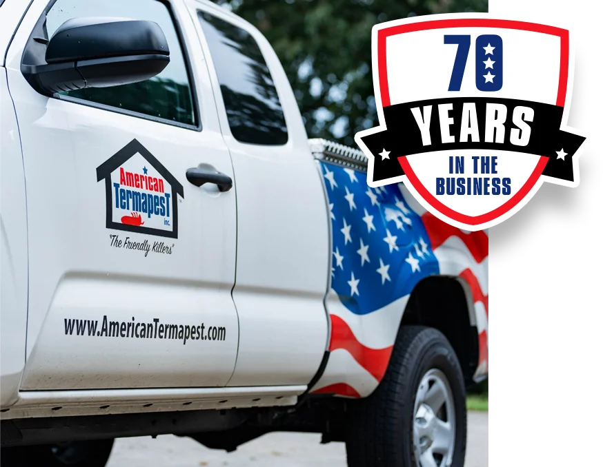 close up photo of the company truck and 70 years badge