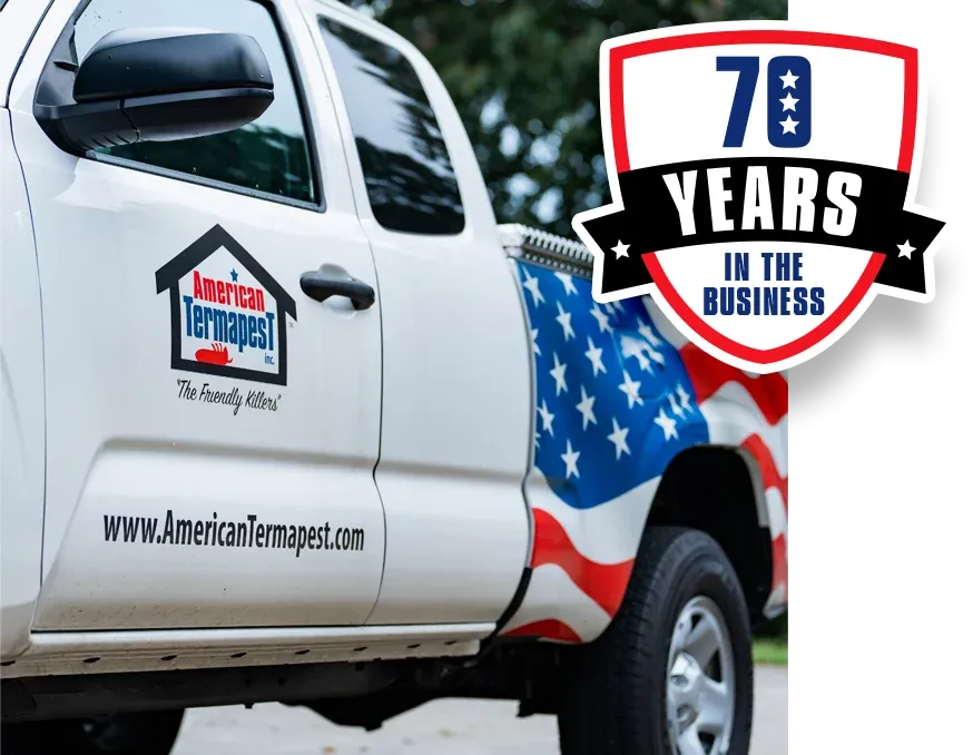 close up photo of the company truck and 70 years badge